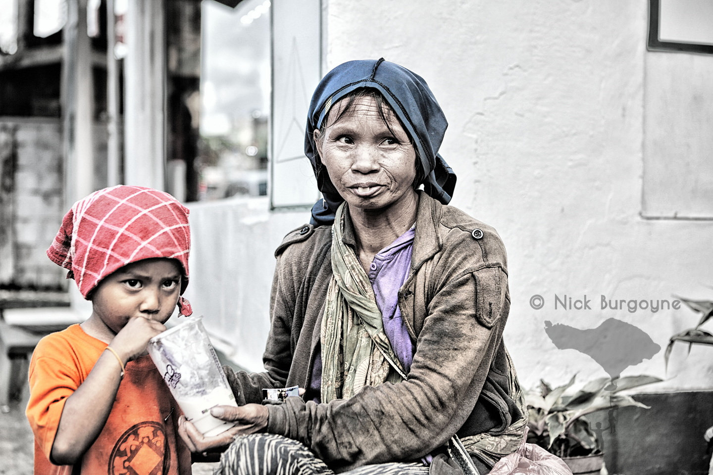	Beggar Lady and Son, Ubud	 